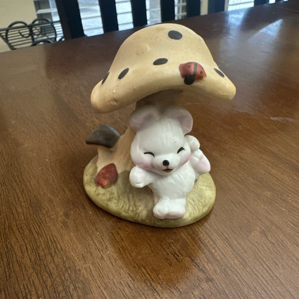 Bisque porcelain figurine blue bunny rabbit under toadstool mushroom 3" tall‎